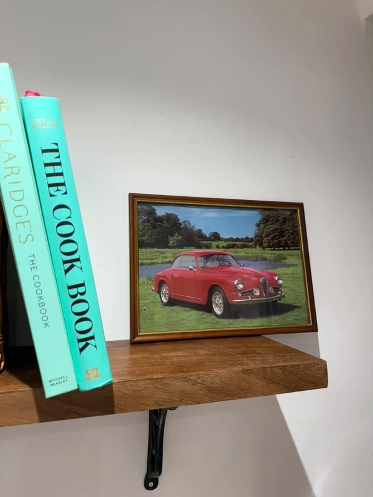 Vintage reclined framed artwork, red sports car country home decor