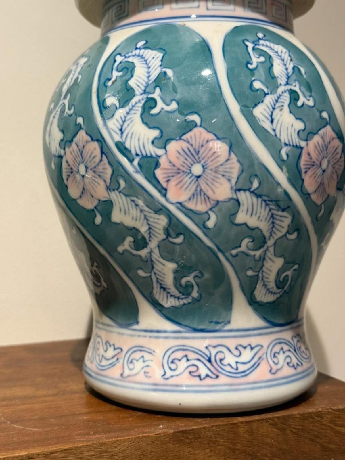 vintage Chinese porcelain ginger jar hand-painted floral motifs in blue, green, and pink colors