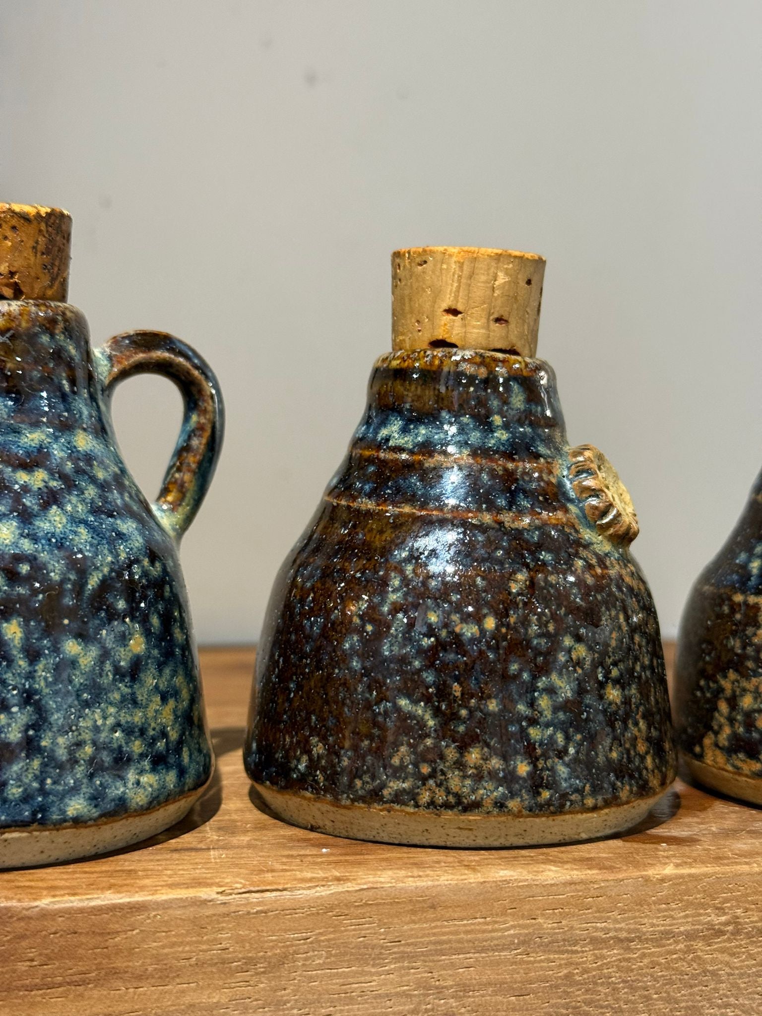Set of Three Studio Pottery Stoneware Bottles with Cork Stoppers